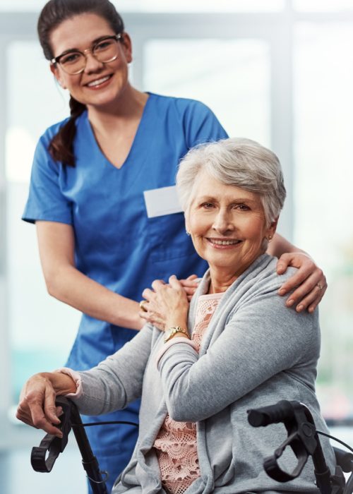Cropped portrait of a young female nurse and her senior patient in the old age home